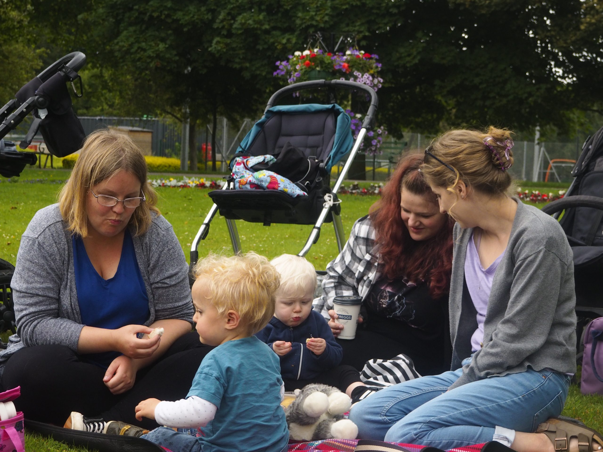 Mums and toddlers enjoying a picnic